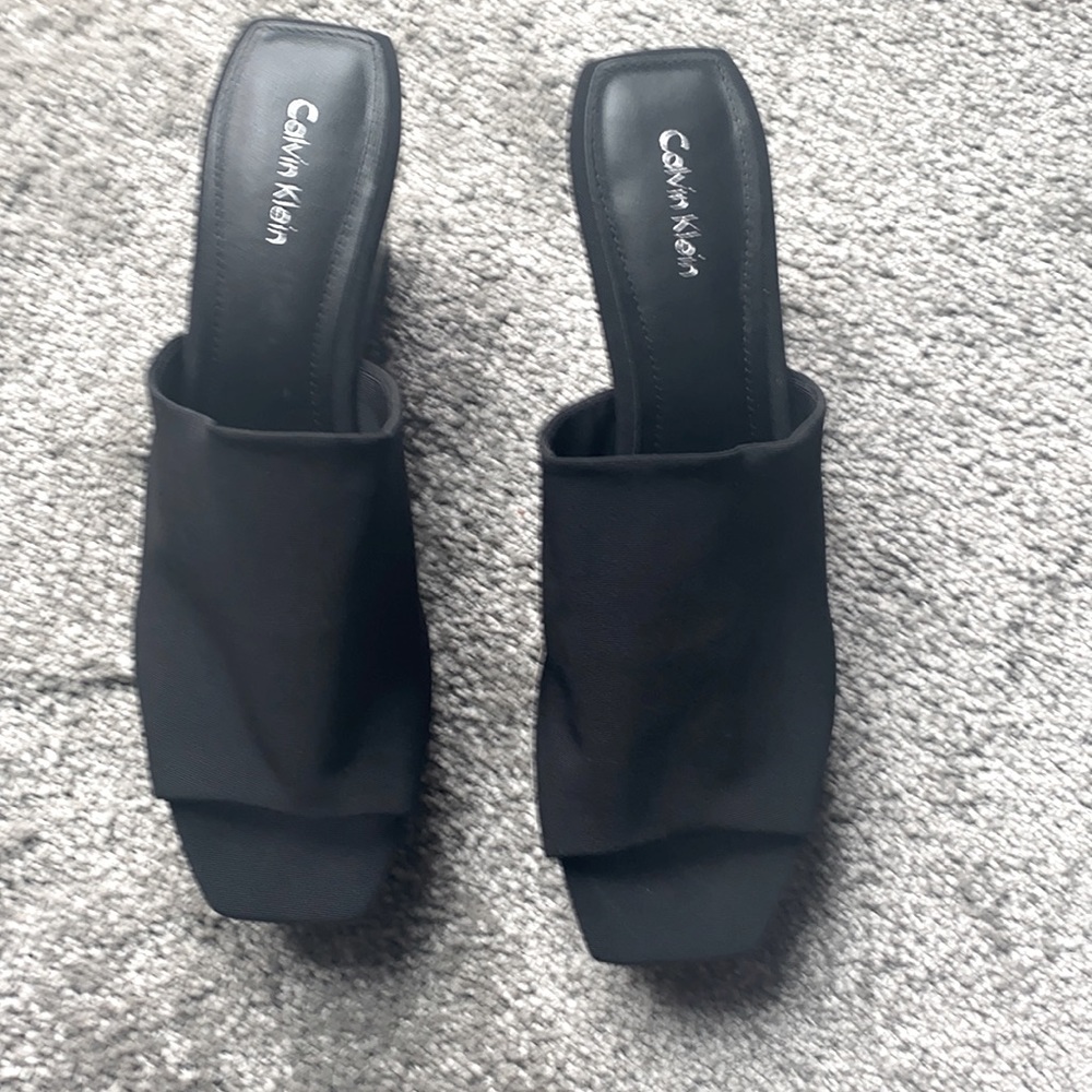 New never worn black sandals.